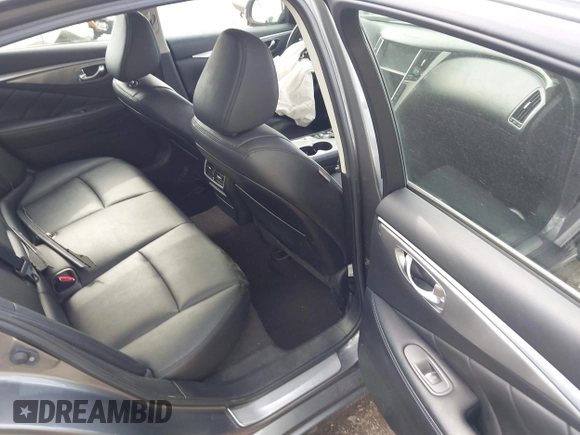 2015 Infiniti Q50 Premium z VIN JN1BV7AR1FM398047, wystawiony jako IAAI lot #42203862 z przebiegiem 104 002 mil mil oraz . Historia ofert i sprzedaży dostępna na DreamBid. Obrazek 8.