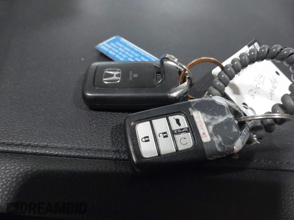 2019 Honda Pilot EX-L with VIN 5FNYF6H51KB099825, listed as a IAAI auction lot 42421688 with 51,370 mi miles and . Bid and sale history available at DreamBid. Image 11.