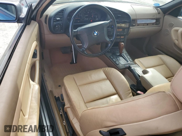 1999 BMW 3 Series z VIN WBABK8330XEY91814, wystawiony jako Copart lot #79799074 z przebiegiem 63 783 mil mil oraz Szkoda całkowita • Salvage title. Historia ofert i sprzedaży dostępna na DreamBid. Obrazek 8.