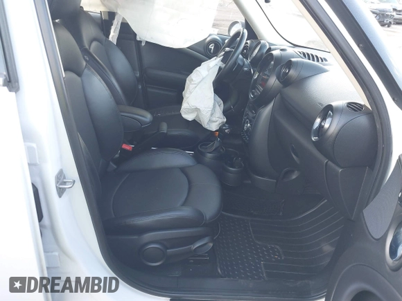 2015 MINI Countryman S with VIN WMWZC3C5XFWT06360, listed as a IAAI auction lot 40774863 with 127,383 mi miles and . Bid and sale history available at DreamBid. Image 5.
