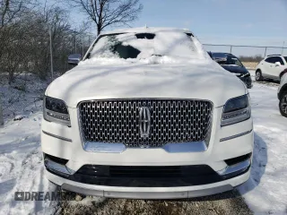 2021 Lincoln Navigator Black Label z VIN 5LMJJ3TTXMEL00316, wystawiony jako Copart lot #44690355 z przebiegiem 20 296 mil mil oraz Szkoda całkowita • Salvage title. Historia ofert i sprzedaży dostępna na DreamBid. Obrazek 5.