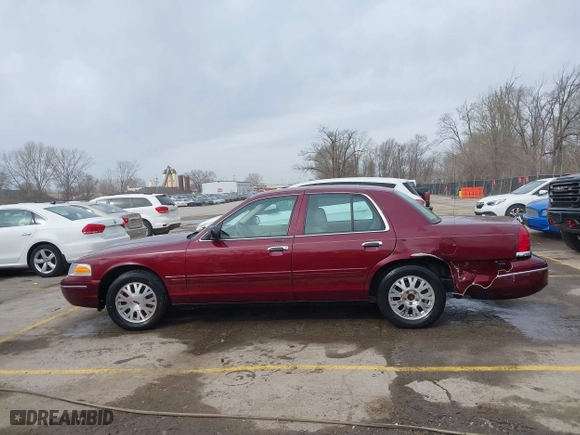 2005 Ford Crown Victoria LX with VIN 2FAFP74W25X106106, listed as a IAAI auction lot 41825793 with 175,740 mi miles. Bid and sale history available at carsss.com. Image 14.