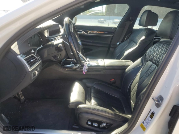 2019 BMW 7 Series 750i with VIN WBA7F0C53KGM25787, listed as a Copart auction lot 88172835 with 71,267 mi miles and Salvage Title. Bid and sale history available at carsss.com. Image 7.