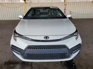 2021 Toyota Corolla SE with VIN JTDM4MCE6MJ072213, listed as a Copart auction lot 86015894 with 50,812 mi miles and Salvage Title. Bid and sale history available at carsss.com. Image 5.