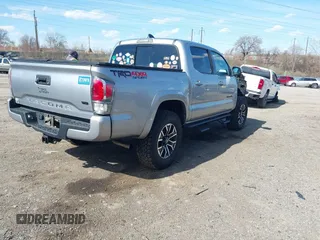2020 Toyota Tacoma SR5 with VIN 3TMCZ5AN3LM320411, listed as a IAAI auction lot 41838498 with 50,252 mi miles and . Bid and sale history available at DreamBid. Image 4.