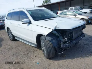 2017 Mercedes-Benz GLS 450 with VIN 4JGDF6EE9HA880687, listed as a IAAI auction lot 41622235 with 106,408 mi miles and . Bid and sale history available at DreamBid. Image 1.