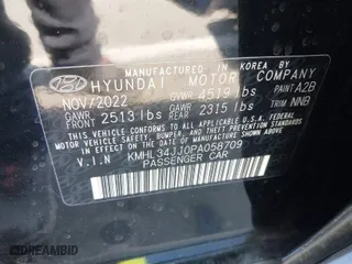 2023 Hyundai Sonata Hybrid SEL with VIN KMHL34JJ0PA058709, listed as a IAAI auction lot 41723513 with 56,495 mi miles. Bid and sale history available at carsss.com. Image 9.