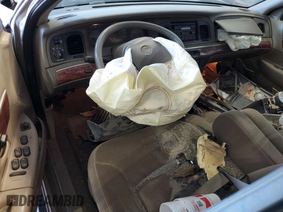 2000 Mercury Grand Marquis LS z VIN 2MEFM75W9YX660599, wystawiony jako Copart lot #52620225 z przebiegiem 88 726 mil mil oraz Szkoda całkowita • Salvage title. Historia ofert i sprzedaży dostępna na DreamBid. Obrazek 8.