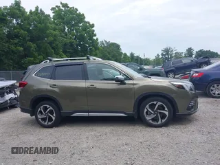 2023 Subaru Forester Touring with VIN JF2SKARC6PH400678, listed as a IAAI auction lot 42694547 with 14,484 mi miles and . Bid and sale history available at DreamBid. Image 14.