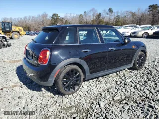 2019 MINI Hardtop 4 Door Cooper with VIN WMWXU1C57K2J02819, listed as a Copart auction lot 42778285 with 27,621 mi miles and Salvage Title. Bid and sale history available at carsss.com. Image 3.