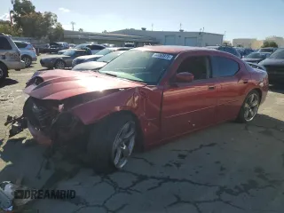 2006 Dodge Charger SRT-8 with VIN 2B3KA73W66H283699, listed as a Copart auction lot 44060975 with 126,105 mi miles and Salvage Title. Bid and sale history available at carsss.com. Image 1.