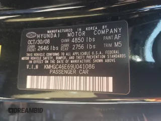 2009 Hyundai Genesis with VIN KMHGC46E69U041086, listed as a Copart auction lot 51020435 with 128,764 mi miles and Salvage Title. Bid and sale history available at DreamBid. Image 14.