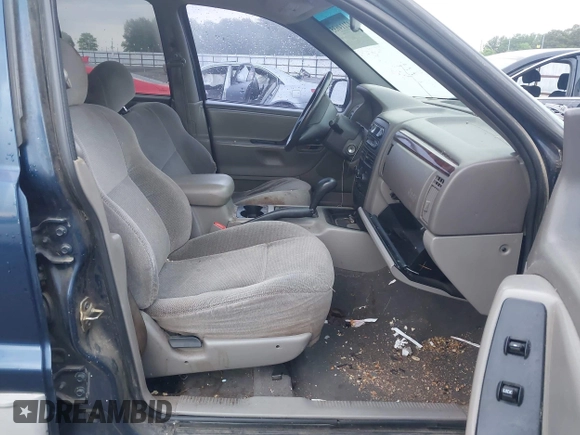 2000 Jeep Grand Cherokee Laredo with VIN 1J4G248S4YC144404, listed as a IAAI auction lot 42114635 with 181,854 mi miles and . Bid and sale history available at DreamBid. Image 5.