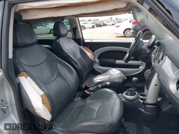 2004 MINI Hardtop with VIN WMWRC33434TJ57506, listed as a IAAI auction lot 42117581 with 148,483 mi miles and . Bid and sale history available at DreamBid. Image 5.