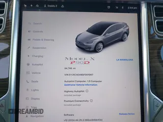 2016 Tesla Model X P90D with VIN 5YJXCAE49GF001067, listed as a IAAI auction lot 41980455 with 94,746 mi miles. Bid and sale history available at carsss.com. Image 7.