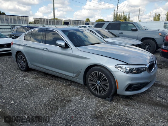 2018 BMW 5 Series 530e with VIN WBAJA9C52JG623073, listed as a Copart auction lot 82718984 with 79,543 mi miles and Clean title. Bid and sale history available at DreamBid. Image 4.
