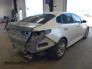 2017 Kia Optima LX with VIN KNAGT4L35H5137739, listed as a IAAI auction lot 42116643 with 114,710 mi miles. Bid and sale history available at carsss.com. Image 4.