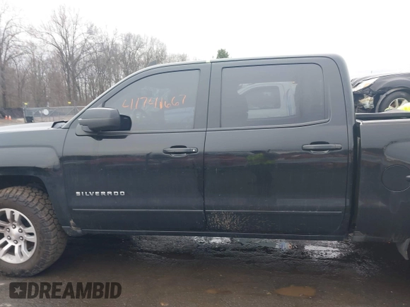 2018 Chevrolet Silverado 1500 LT with VIN 3GCUKREC5JG460979, listed as a IAAI auction lot 41741667 with 122,931 mi miles. Bid and sale history available at carsss.com. Image 15.