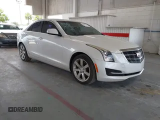 2015 Cadillac ATS Standard RWD z VIN 1G6AA5RA1F0139172, wystawiony jako IAAI lot #42486637 z przebiegiem 123 902 mil mil oraz . Historia ofert i sprzedaży dostępna na DreamBid. Obrazek 1.