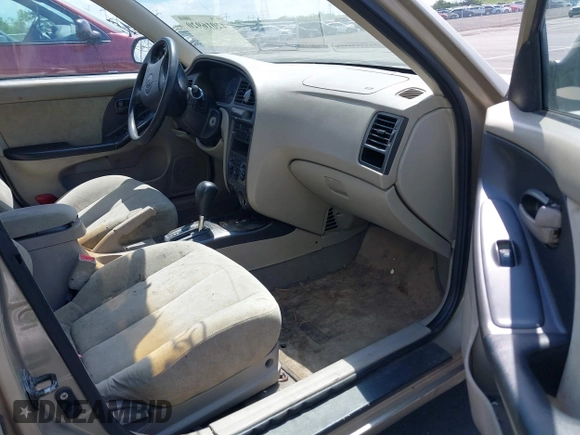 2003 Hyundai Elantra GLS z VIN KMHDN45D83U514659, wystawiony jako IAAI lot #42016920 z przebiegiem 125 673 mil mil oraz . Historia ofert i sprzedaży dostępna na DreamBid. Obrazek 5.