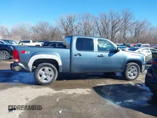 2007 GMC Sierra 1500 SLT z VIN 2GTEK133X71616220, wystawiony jako IAAI lot #41669281 z przebiegiem 269 626 mil mil oraz . Historia ofert i sprzedaży dostępna na DreamBid. Obrazek 14.