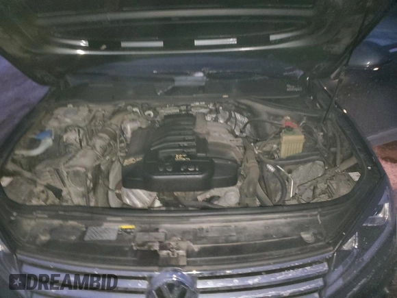 2016 Volkswagen Touareg Sport with VIN WVGEF9BP2GD005296, listed as a Copart auction lot 88808735 with 133,429 mi miles and Salvage Title. Bid and sale history available at DreamBid. Image 13.