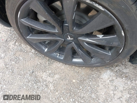 2020 Tesla Model 3 Long Range with VIN 5YJ3E1EB2LF646449, listed as a IAAI auction lot 42059086 with 120,981 mi miles and . Bid and sale history available at DreamBid. Image 12.