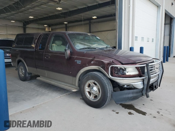 2001 Ford F-150 XL with VIN 1FTRX17W71NA45086, listed as a Copart auction lot 54182945 with 173,998 mi miles and Salvage title. Bid and sale history available at DreamBid. Image 4.