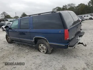 1997 GMC Suburban with VIN 3GKFK16R4VG519902, listed as a Copart auction lot 79031204 with 195,624 mi miles and Salvage Title. Bid and sale history available at DreamBid. Image 2.