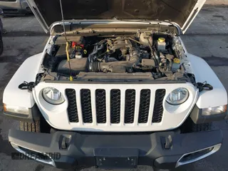 2023 Jeep Gladiator Sport S z VIN 1C6HJTAG7PL535209, wystawiony jako IAAI lot #41483780 z przebiegiem 39 376 mil mil oraz . Historia ofert i sprzedaży dostępna na DreamBid. Obrazek 10.