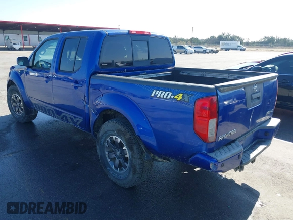 2014 Nissan Frontier SV with VIN 1N6AD0EV4EN720325, listed as a IAAI auction lot 41479133 with 61,661 mi miles and . Bid and sale history available at DreamBid. Image 3.