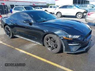 2019 Ford Mustang EcoBoost with VIN 1FA6P8THXK5124729, listed as a IAAI auction lot 42384176 with 134,028 mi miles and . Bid and sale history available at DreamBid. Image 1.