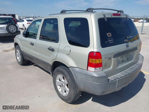 2005 Ford Escape XLT with VIN 1FMCU03165DA08296, listed as a IAAI auction lot 41677892 with 255,431 mi miles. Bid and sale history available at carsss.com. Image 3.