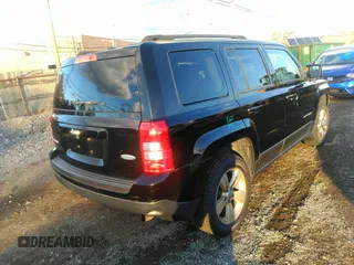 2014 Jeep Patriot Latitude with VIN 1C4NJRFB0ED799097, listed as a IAAI auction lot 40834502 with 192,940 mi miles. Bid and sale history available at carsss.com. Image 4.