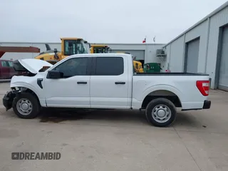 2023 Ford F-150 XL with VIN 1FTEW1C5XPKF56011, listed as a IAAI auction lot 40909405 with Not provided miles and . Bid and sale history available at DreamBid. Image 13.