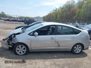 2007 Toyota Prius with VIN JTDKB20U877085818, listed as a IAAI auction lot 42009652 with 192,082 mi miles and . Bid and sale history available at DreamBid. Image 14.