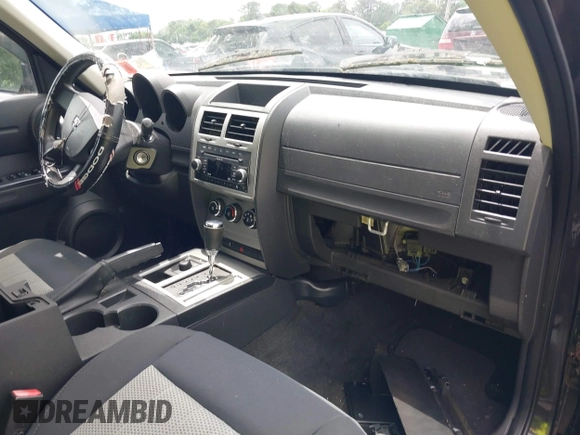 2010 Dodge Nitro SE with VIN 1D4PU2GK0AW142999, listed as a IAAI auction lot 42549000 with 87,577 mi miles and . Bid and sale history available at DreamBid. Image 5.