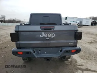 2021 Jeep Gladiator High Altitude с VIN 1C6HJTFGXML600395, выставлен на аукционе Copart как лот 50393625 с пробегом 45 079 миль миль и Списание • Salvage title. История ставок и продаж доступна на DreamBid. Изображение 6.