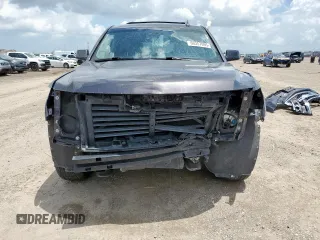 2018 Chevrolet Tahoe LT with VIN 1GNSCBKC8JR135511, listed as a Copart auction lot 60357095 with 123,904 mi miles and Salvage title. Bid and sale history available at DreamBid. Image 5.