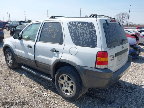 2004 Ford Escape XLT with VIN 1FMYU93164KA96674, listed as a IAAI auction lot 41780474 with 182,525 mi miles. Bid and sale history available at carsss.com. Image 3.