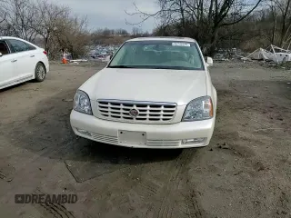 2003 Cadillac DeVille DTS z VIN 1G6KF57993U201484, wystawiony jako Copart lot #43742375 z przebiegiem 53 478 mil mil oraz Szkody całkowita. Historia ofert i sprzedaży dostępna na DreamBid. Obrazek 10.