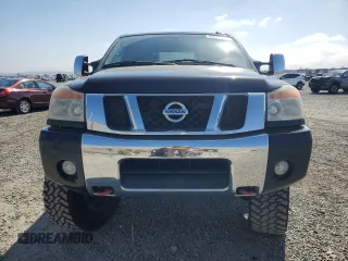2011 Nissan Titan SL with VIN 1N6BA0EC4BN319994, listed as a Copart auction lot 55088175 with 103,008 mi miles and Salvage title. Bid and sale history available at DreamBid. Image 5.