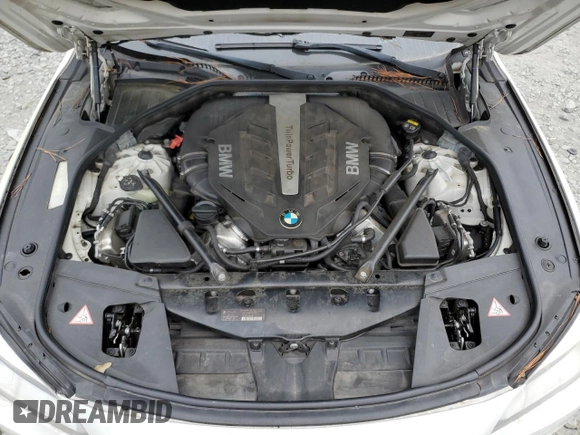 2015 BMW 7 Series 750i z VIN WBAYA8C5XFD825662, wystawiony jako Copart lot #78850474 z przebiegiem 153 080 mil mil oraz Czysty tytuł • Clean title. Historia ofert i sprzedaży dostępna na DreamBid. Obrazek 11.