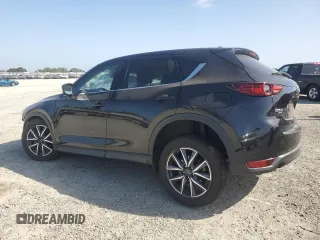 2018 Mazda CX-5 Grand Touring z VIN JM3KFBDM0J0399985, wystawiony jako Copart lot #54097665 z przebiegiem 45 344 mil mil oraz Szkoda całkowita • Salvage title. Historia ofert i sprzedaży dostępna na DreamBid. Obrazek 2.