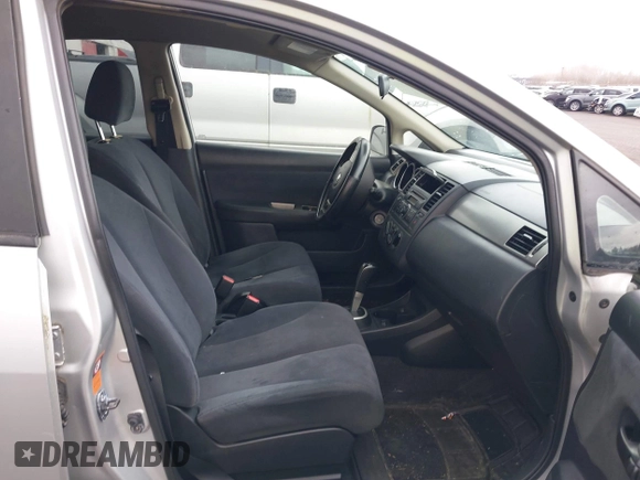 2009 Nissan Versa 1.8 SL with VIN 3N1BC13E19L500653, listed as a IAAI auction lot 41616544 with 138,554 mi miles. Bid and sale history available at carsss.com. Image 5.