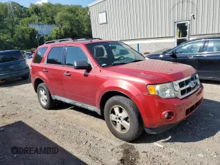 2012 Ford Escape XLT with VIN 1FMCU9DG0CKA80580, listed as a Copart auction lot 87202144 with 173,098 mi miles and Salvage title. Bid and sale history available at DreamBid. Image 4.