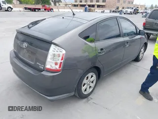 2007 Toyota Prius z VIN JTDKB20U573236900, wystawiony jako IAAI lot #42375325 z przebiegiem Nie podano mil oraz . Historia ofert i sprzedaży dostępna na DreamBid. Obrazek 4.