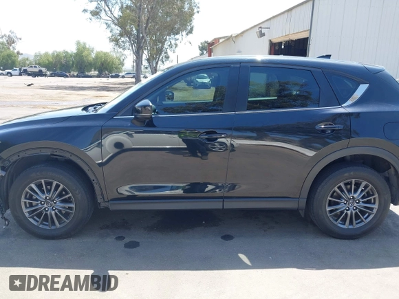 2019 Mazda CX-5 Sport with VIN JM3KFABM7K1509987, listed as a IAAI auction lot 42062804 with 50,898 mi miles and . Bid and sale history available at DreamBid. Image 15.
