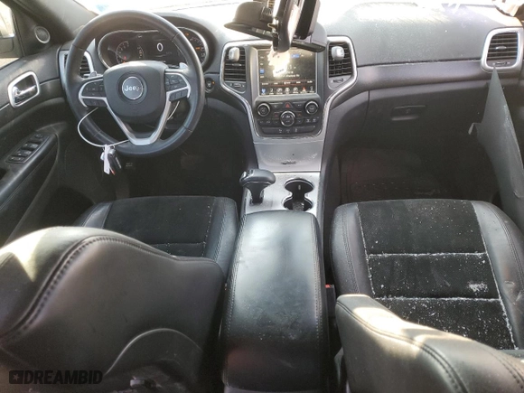 2015 Jeep Grand Cherokee Altitude with VIN 1C4RJFAG0FC136039, listed as a Copart auction lot 89237525 with 124,374 mi miles and Salvage Title. Bid and sale history available at carsss.com. Image 8.