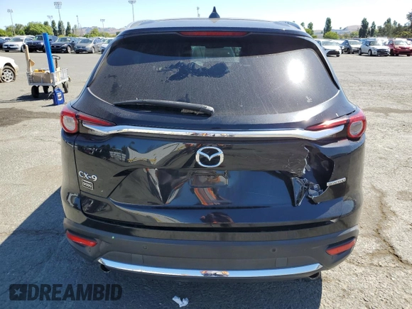 2020 Mazda CX-9 Grand Touring z VIN JM3TCADYXL0414926, wystawiony jako Copart lot #57528945 z przebiegiem 93 768 mil mil oraz Szkoda całkowita • Salvage title. Historia ofert i sprzedaży dostępna na DreamBid. Obrazek 6.